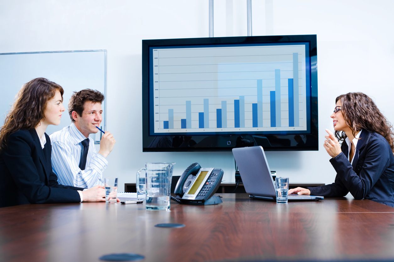 Businesspeople Discussing In Meeting Room. Click Here For Other Business Images: